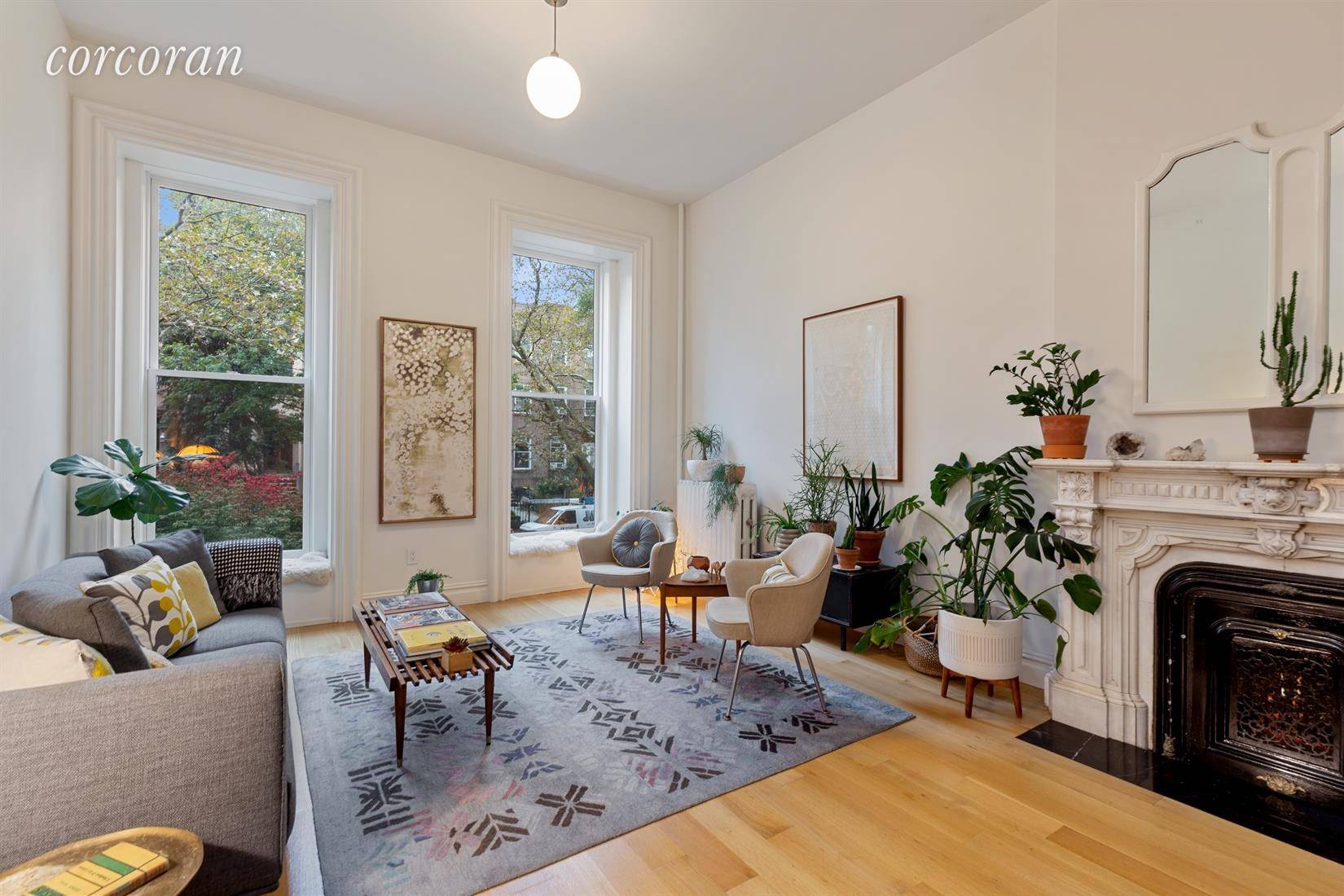 Located on the parlor floor of a 25' wide brownstone on one of the most beautiful blocks in Carroll Gardens, this gorgeously renovated two bedroom home is an absolute stunner.