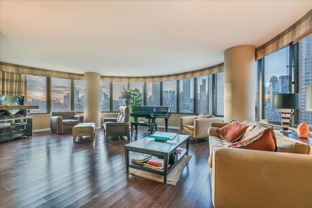 15 windowed living room in this 1372 SF large 2 BR 2 BA in the Corinthian Condominiums.