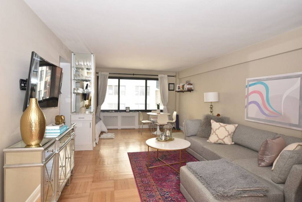 Sunny and bright alcove studio w city viewsTons of custom closets spaceWall of windowsGut renovated bathroom and kitchen with high end stainless steel appliances.