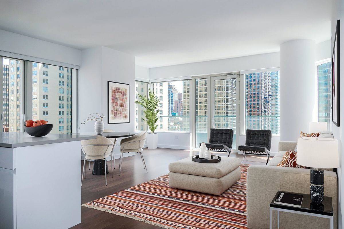 Over-sized 2 Bedroom w/ TONS of Natural Light in Midtown East! NO BROKER'S FEE.