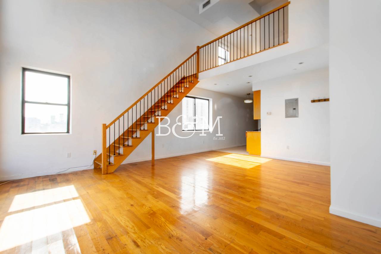 Our thoughts... This is your chance to live in prime North Williamsburg in this large open layout penthouse duplex loft with two bathrooms.