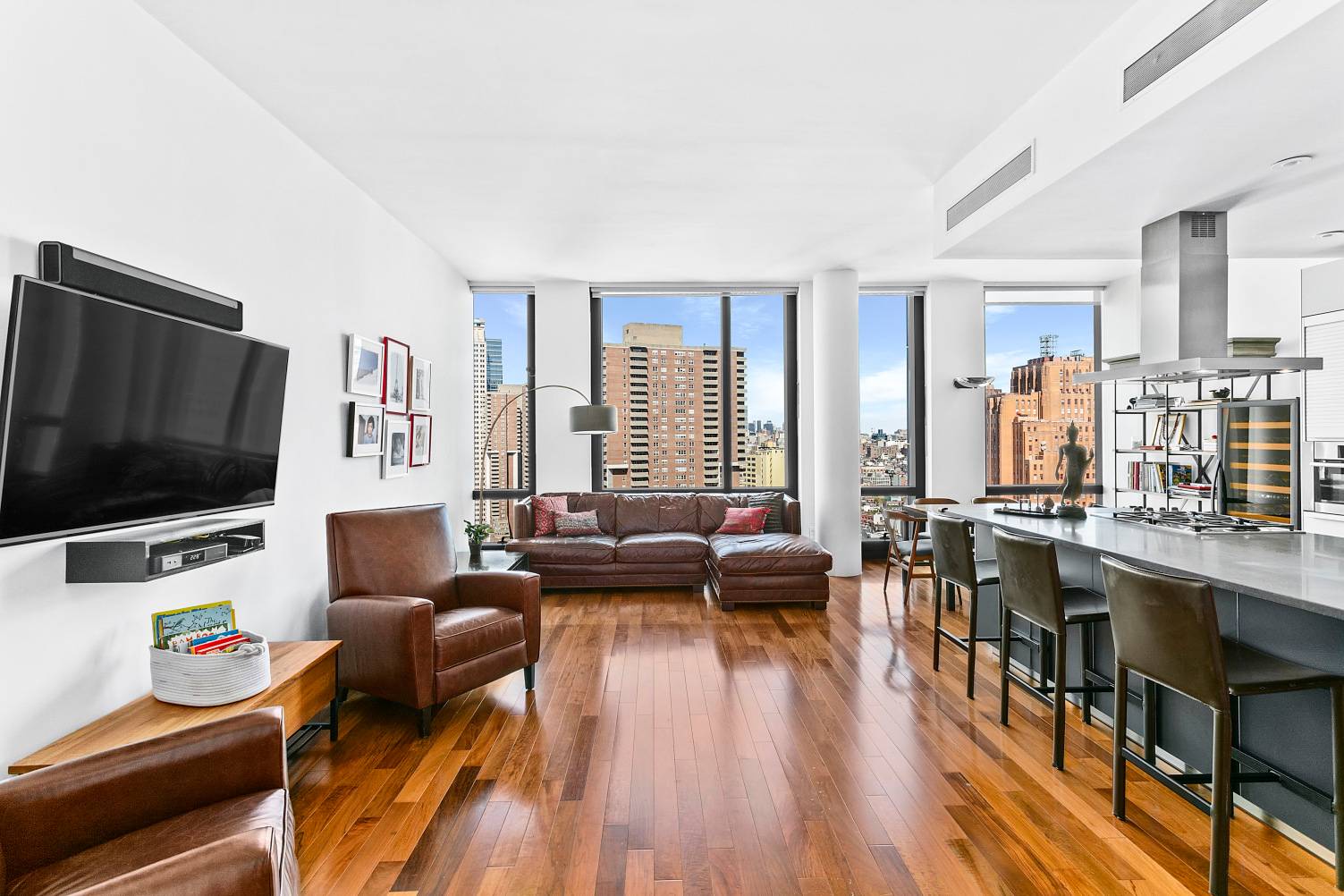 Enjoy breathtaking city views from every room of this winged two bedroom, two and a half bath prime, TriBeCa apartment.
