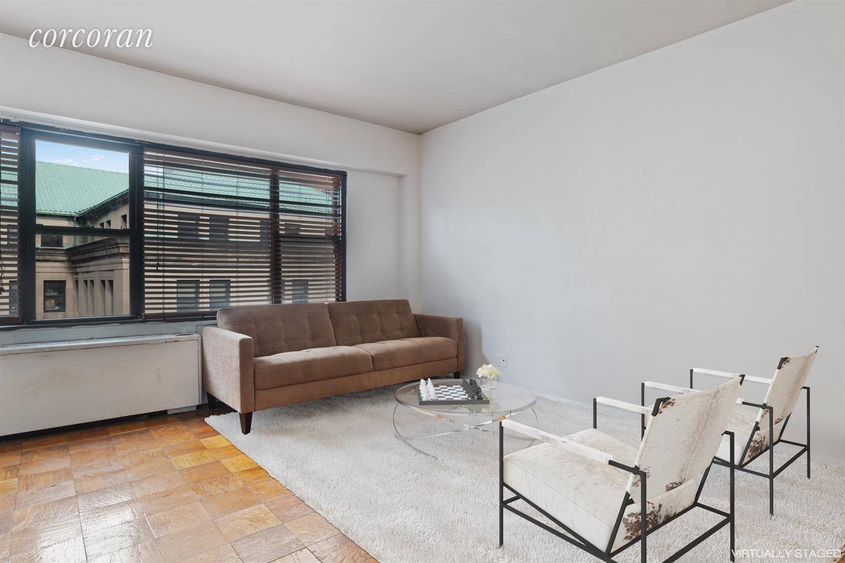 Unit 18B is a spacious alcove studio convertible junior one bedroom apartment in a full service doorman building in Brooklyn Heights Downtown.