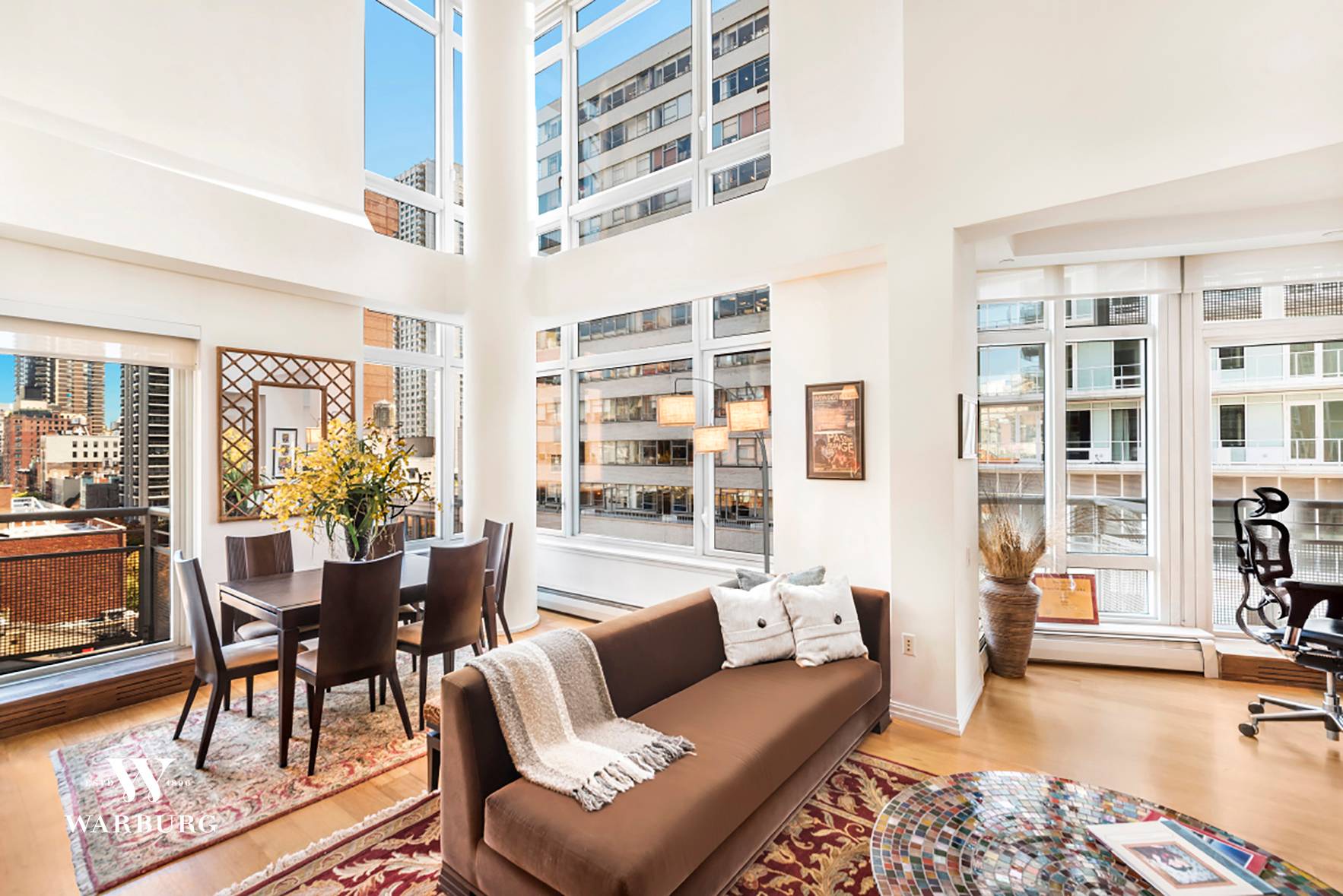 Gorgeous loft in the heart of the City Sun drenched light lovers paradise with spectacular views east to the Queensboro Bridge from two balconies.