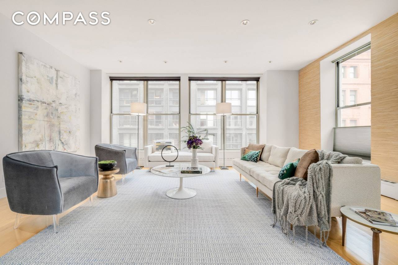 Located on 18th Street between Sixth and Seventh Avenue in the historic Chainworks Building, Residence 4 East is a sprawling three bedroom, three bath condominium loft.