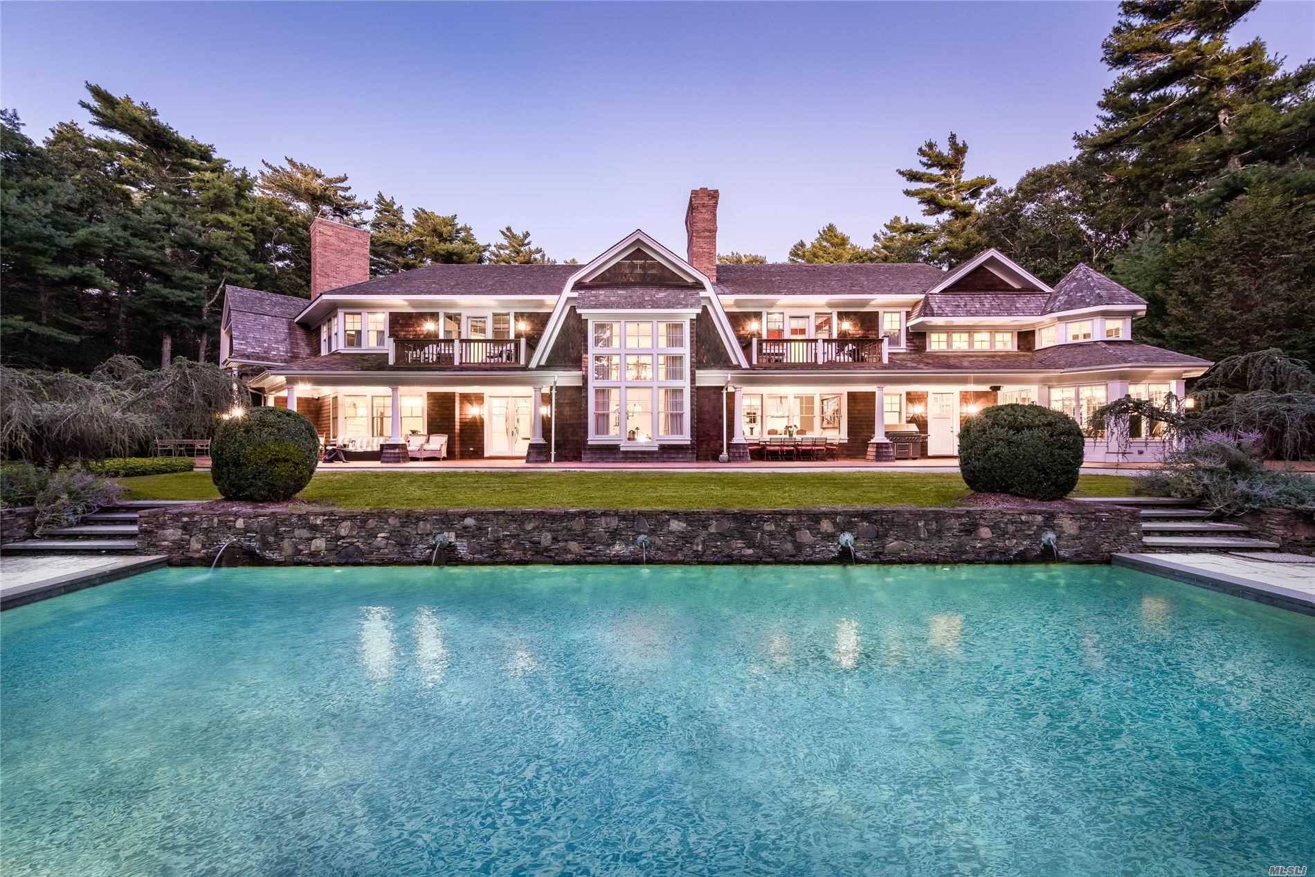 A sophisticated and meticulously crafted estate sits on three acres on prestigious Bull Path, minutes from the Villages of East Hampton and Sag Harbor.