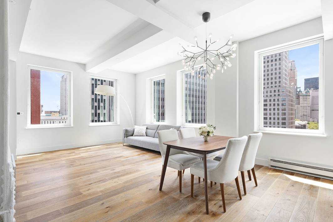 Bask in extraordinary light and luxury in this beautiful three bedroom, three and a half bathroom home in a premier, full service Tribeca condominium.