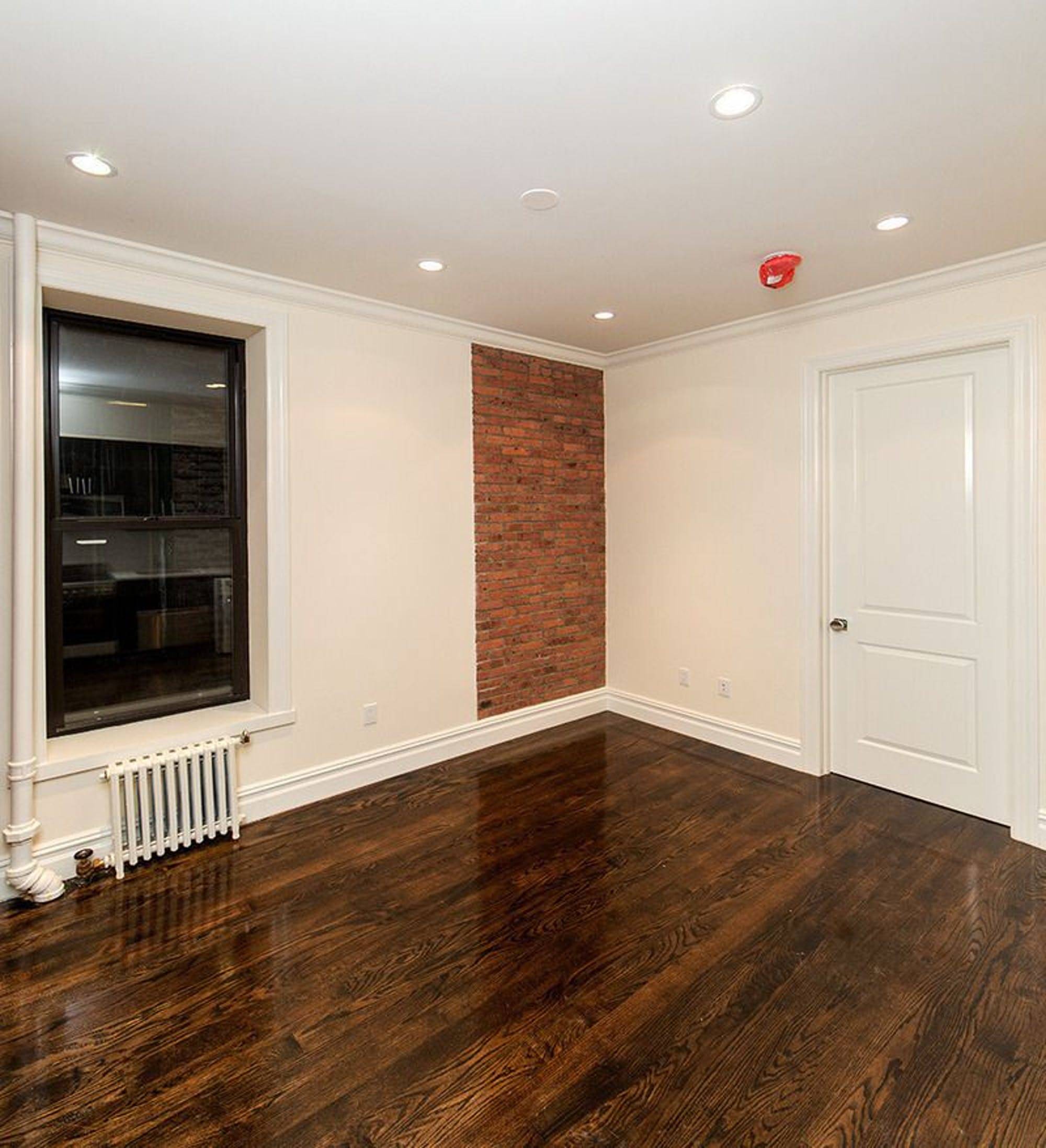 Welcome to 747 Ninth Ave Come tour this beautifully renovated 3 bedroom department available for December 1st Apartment Features Exposed Brick Wide Plank Ebony Hardwood Flooring Chef's Kitchen w.