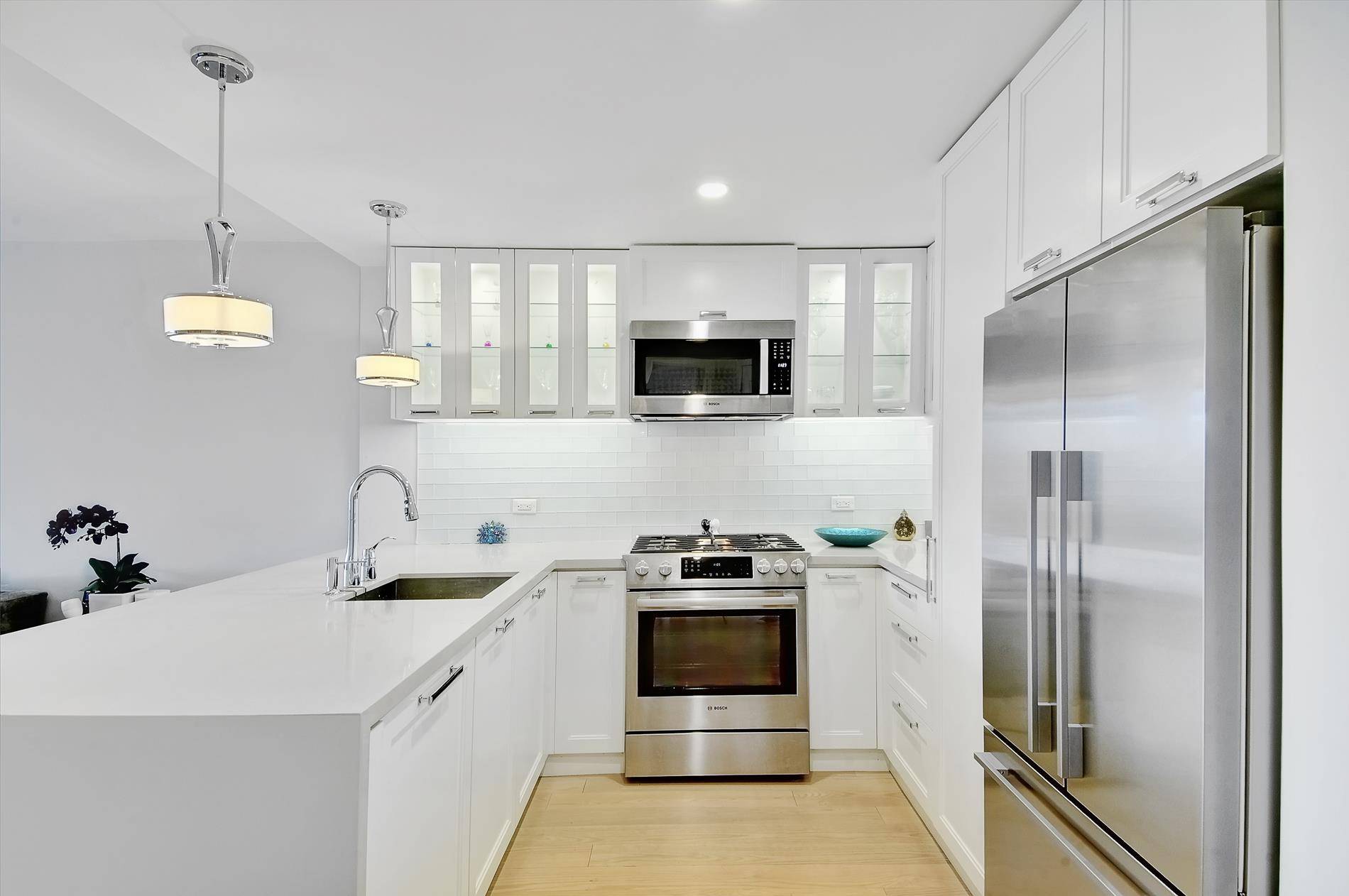 Sorry no pets ! Newly renovated unit by acclaimed architect Andres Escobar with a brand new kitchen, bathrooms, floors, lighting and IN UNIT washer dryer !