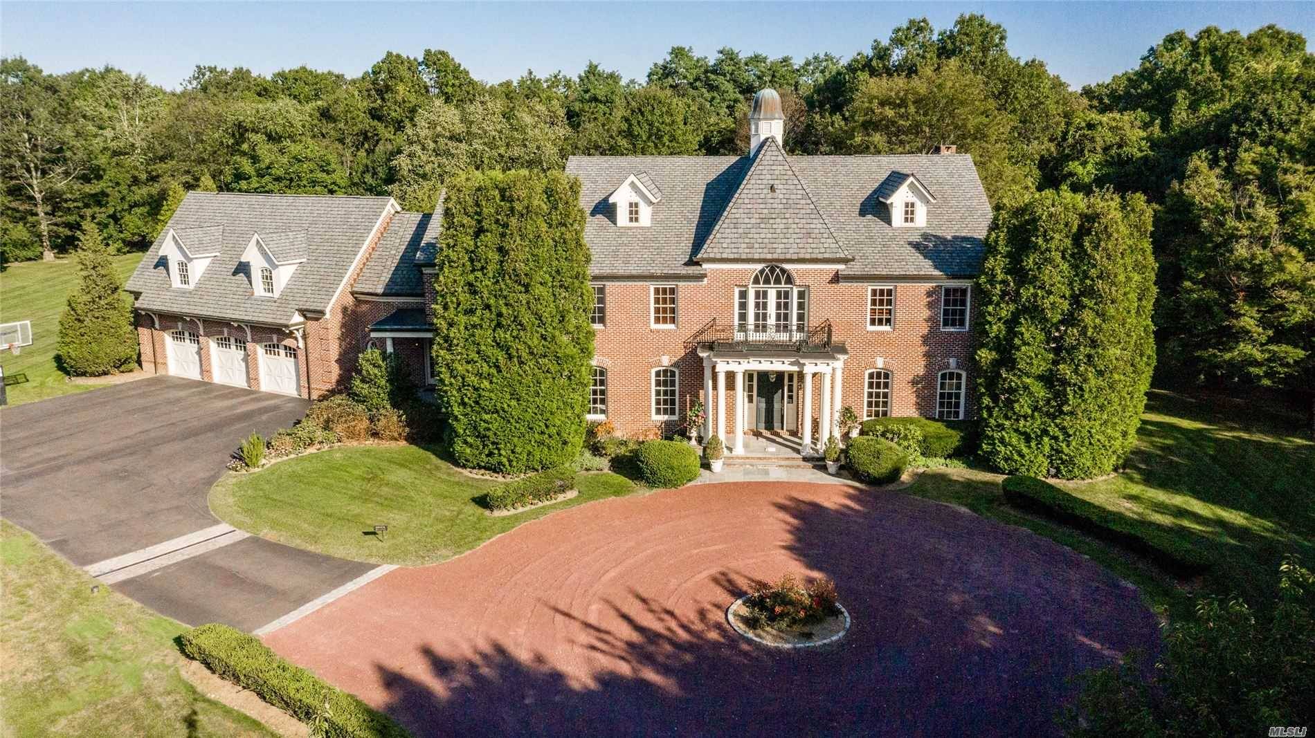 Magnificent Brick Colonial Designed by Bob Madey offers 7, 308 sq ft expandable 2K.