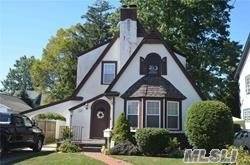 Beautiful Tudor Colonial Located In The Award Winning Plaza Elementary School District.