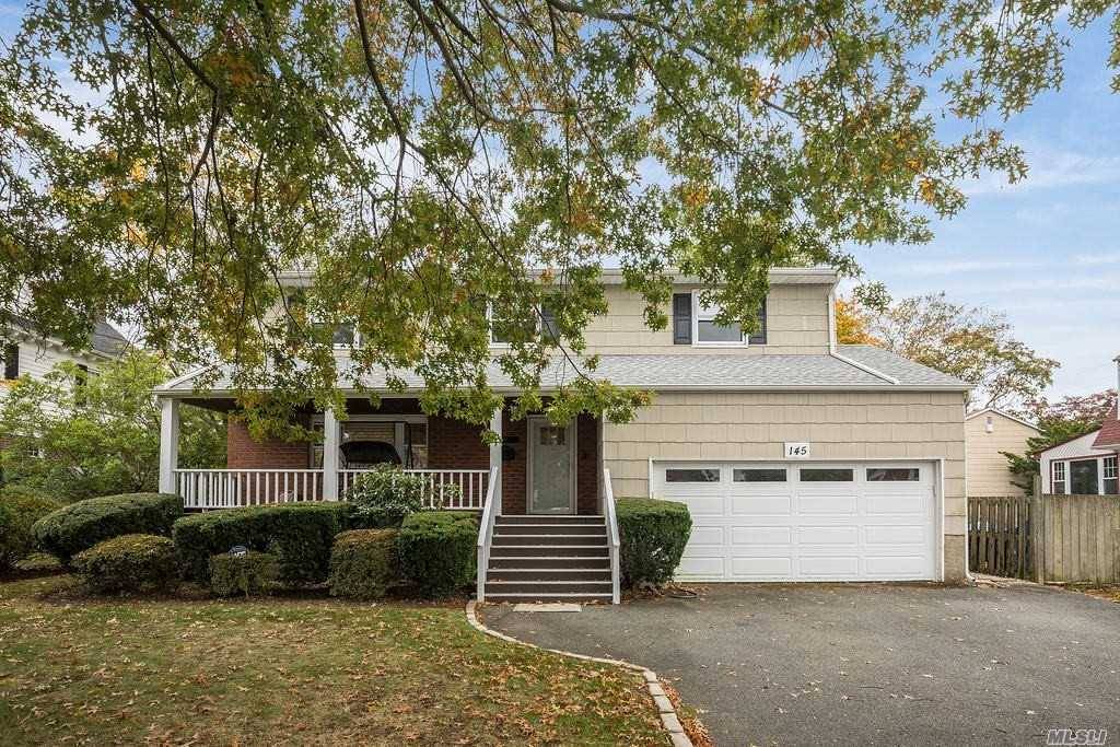 Immaculate 4 Bdrm 3. 5 Bth colonial in the heart of Woodmere.
