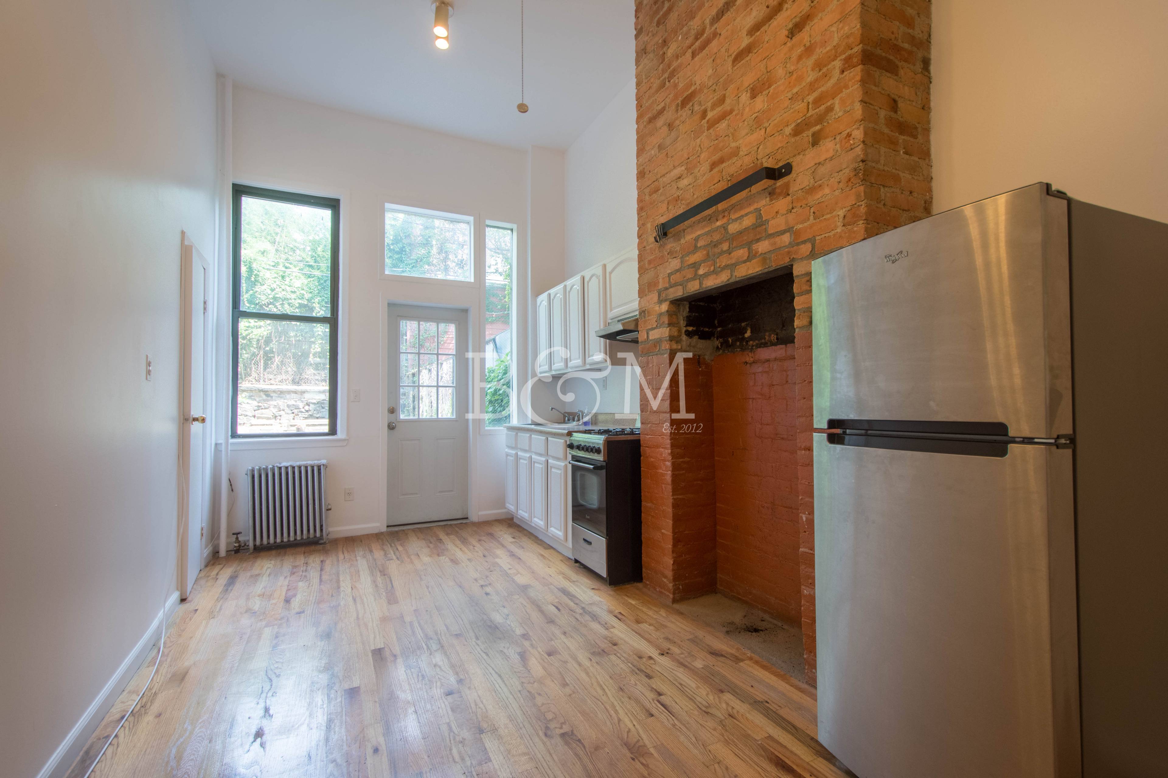 Our Thoughts This Massive Two bedroom Railroad apartment with private backyard in Williamsburg, Brooklyn.