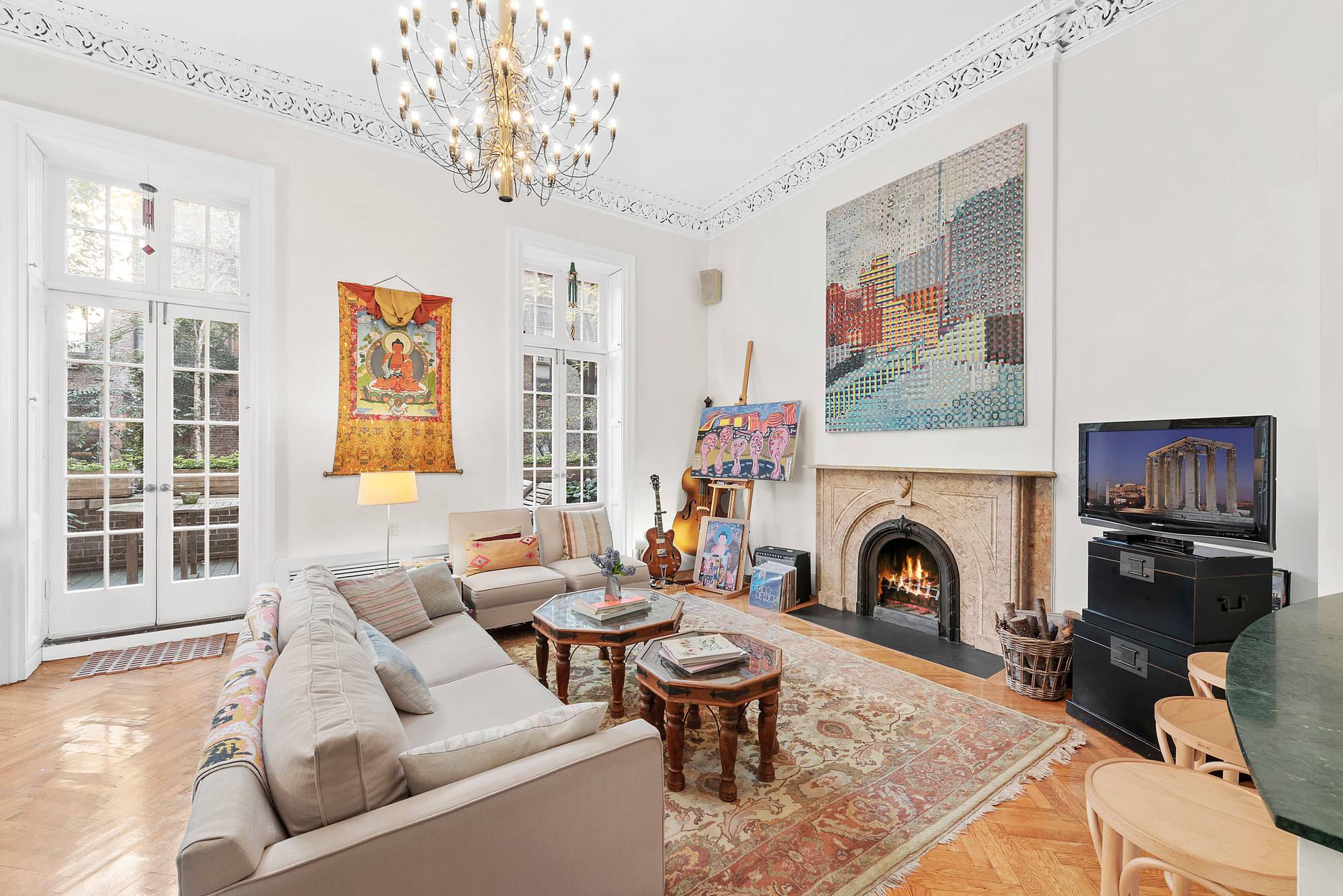 137 East 15th Street Rare opportunity to own a sunny parlor floor 2 bedroom, 2 bath duplex with private outdoor space in a 19th century townhouse !