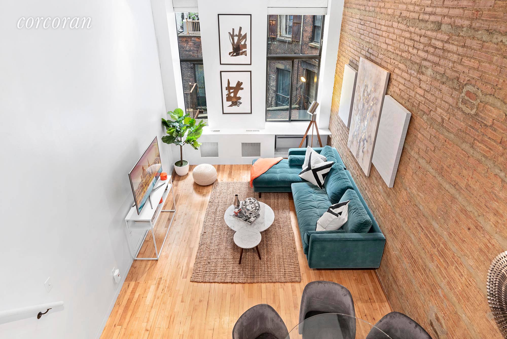 Stylish Loft offers pre war architectural details including 13.