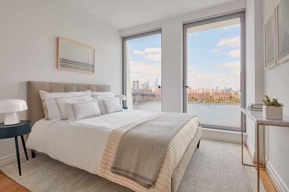Corner Two Bed Two Bath with floor-to-ceiling windows framing unobstructed views