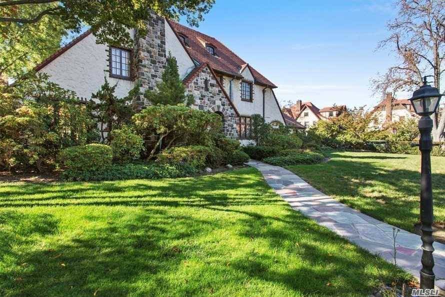 Beautiful classic Tudor home with 5 bedrooms 5 baths in prestige Forest Hills Gardens.