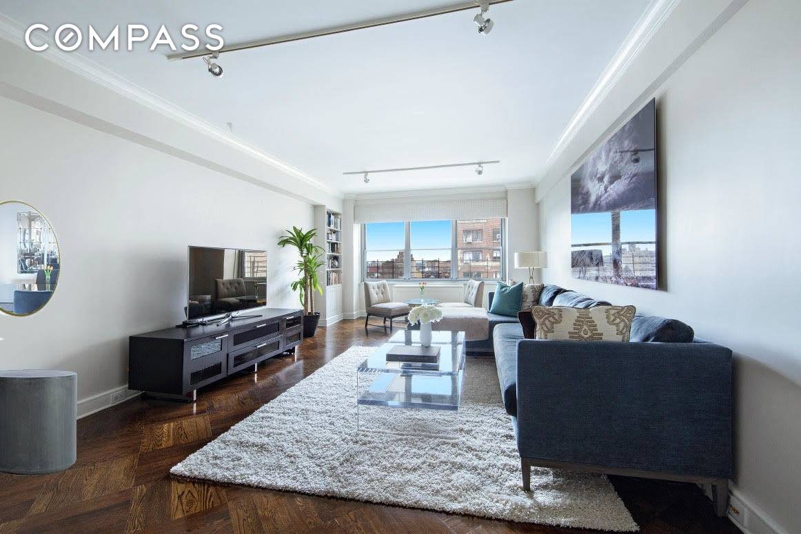Enjoy magnificent views in this masterfully renovated, triple mint, split two bedroom, two bathroom home in one of Lower Fifth Avenue s most desired buildings.