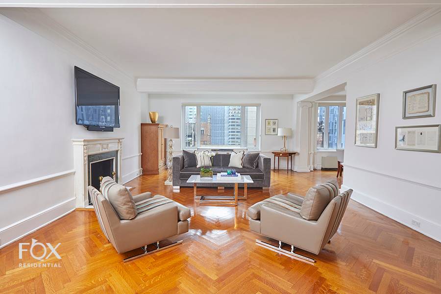 Timeless beauty awaits you at this pristine two bedroom plus staff room gem in the heart of Central Park South.