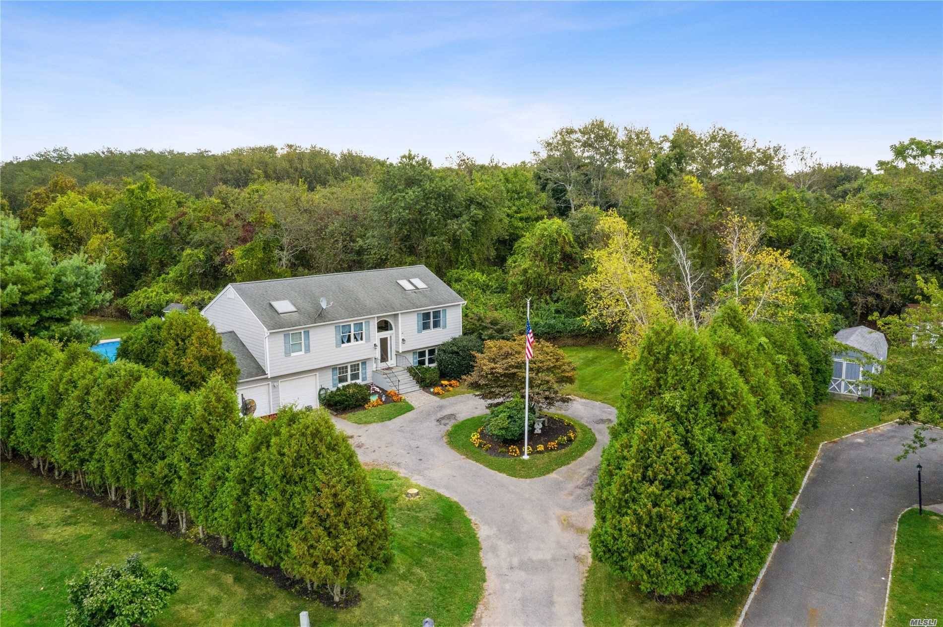 Tucked in the back of a cul de sac and surrounded by 40 acres of wooded land this private property and spacious home is ideal for comfortably entertaining large groups.