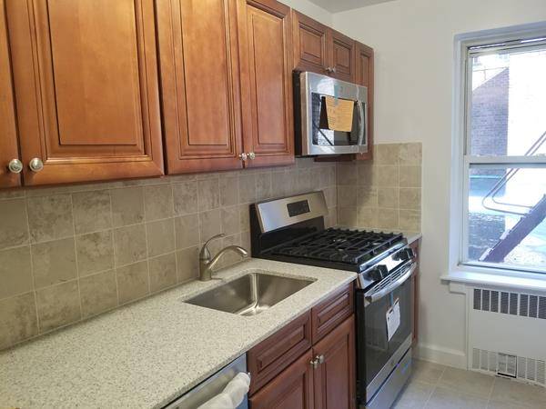 Totally renovated Two BR sponsor unit in sought after Sunnyhill Gardens with low maintenance, gym, parking garage, easy commute and requiring no board approval.