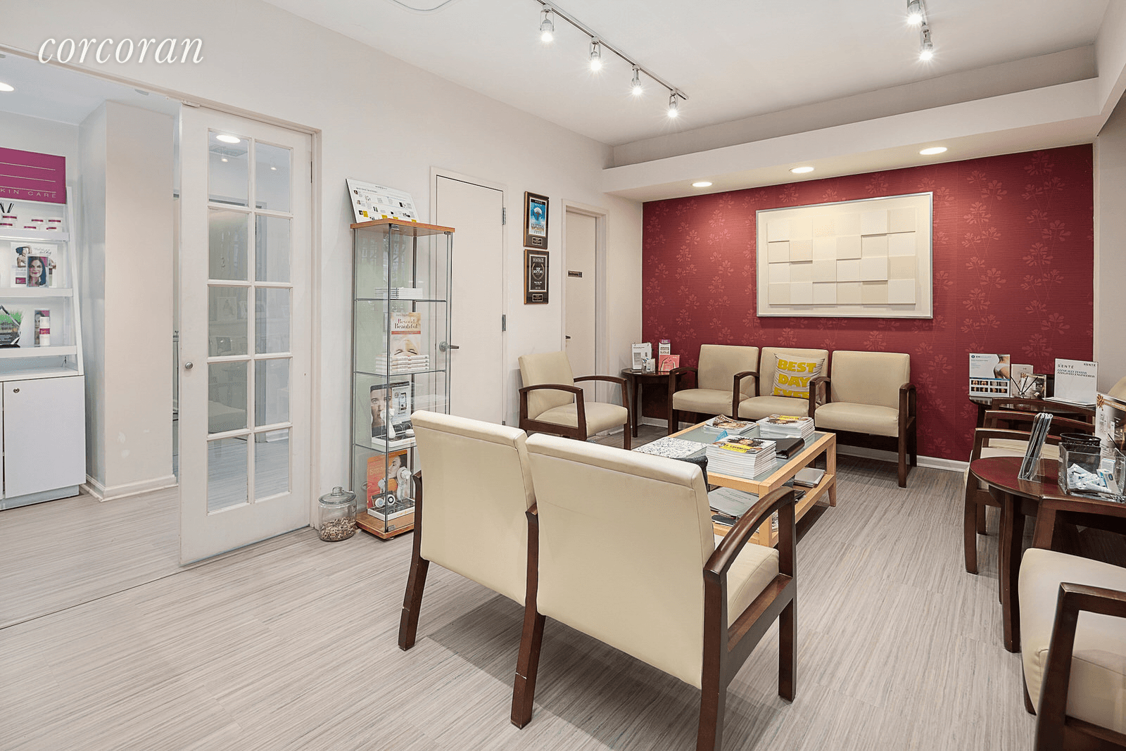 Turn key dermatologist's office in pristine condition, featuring a spacious waiting room and elegantly configured reception area.