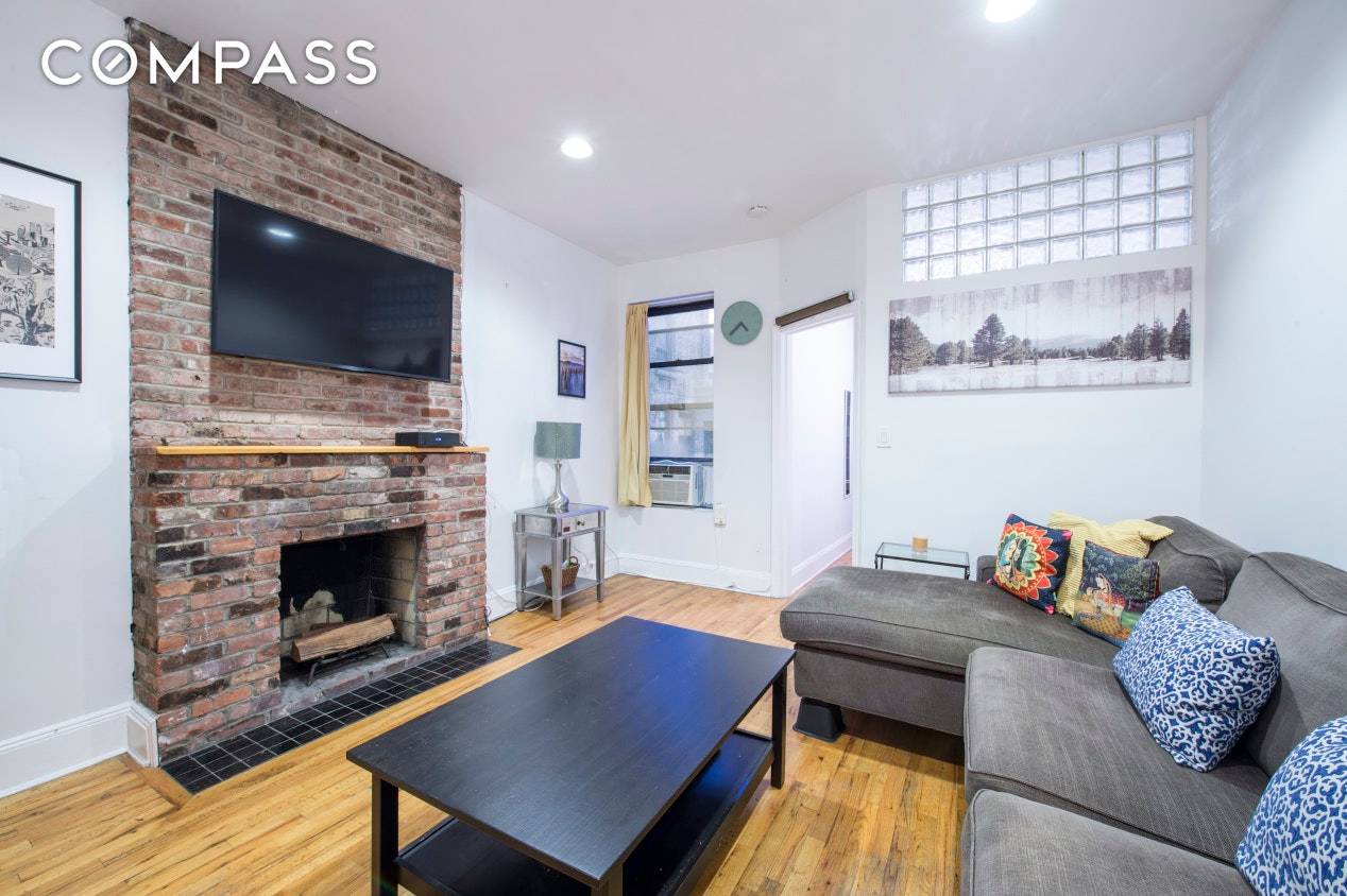 Move right into this beautiful, renovated split two bedroom, 1.