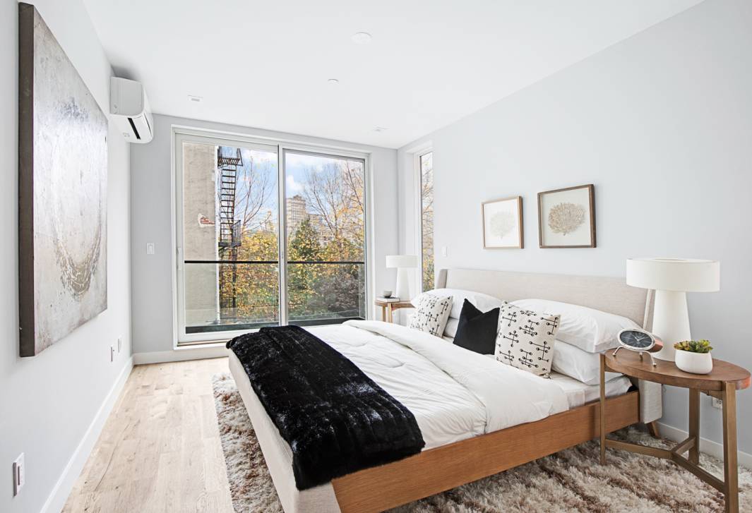 Residence 4 at 16 Underhill Ave offers a Two bedroom 2BD, Two bathroom 2BA home with 1, 102 interior sf, a balcony, terrace and a 372 sf private roof deck ...