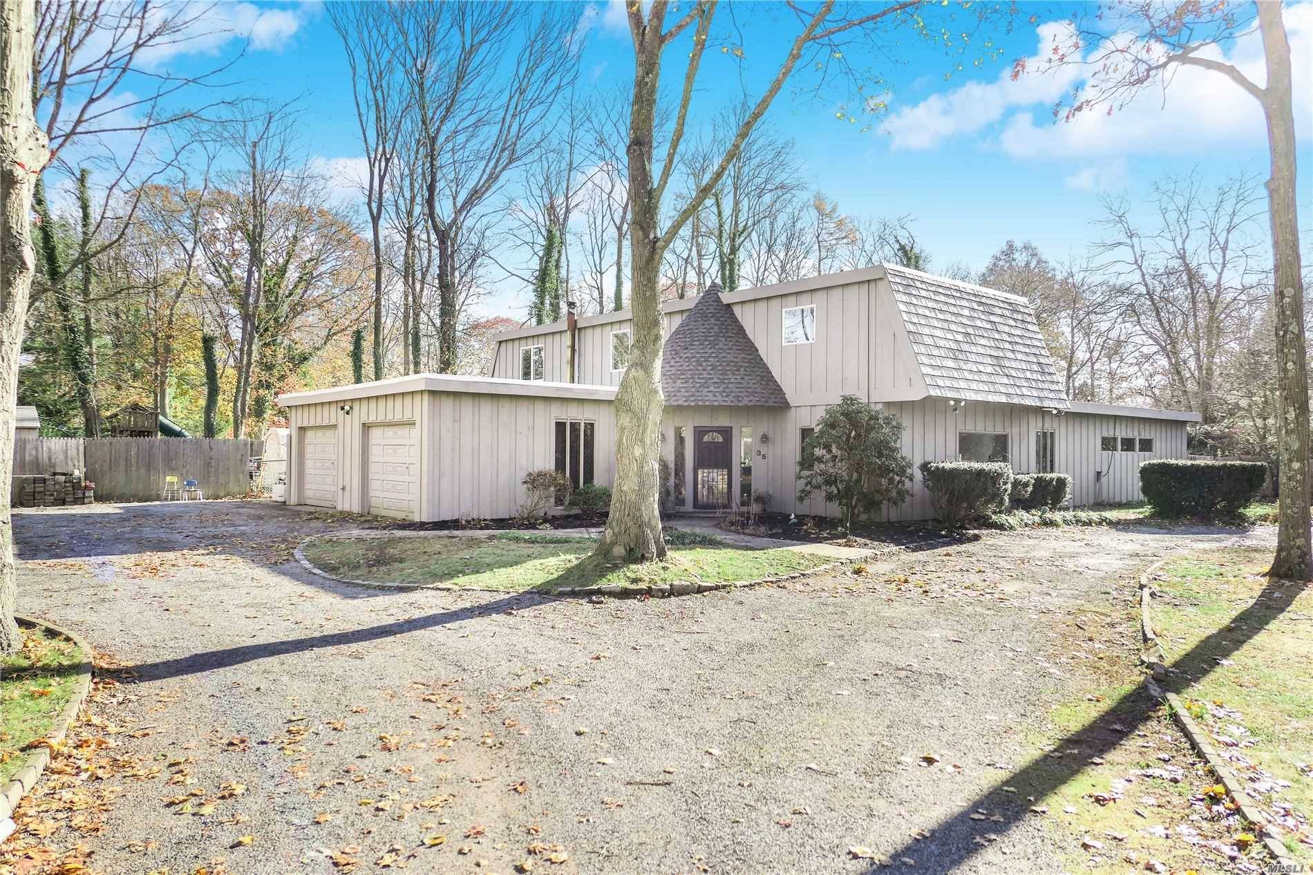 Start Your New Year In Luxury as Mid Century Meets Modern For This Unique and Distinguishing Home Located In Bellport Beach Estates !