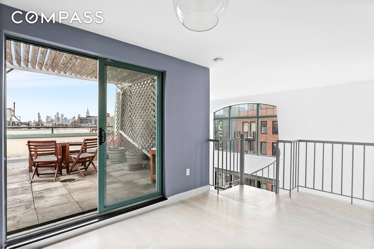In the heart of Williamsburg is this gorgeous 2 BR, 1 BA loft like duplex with a private roof terrace, sweeping Manhattan skyline views and an additional balcony.