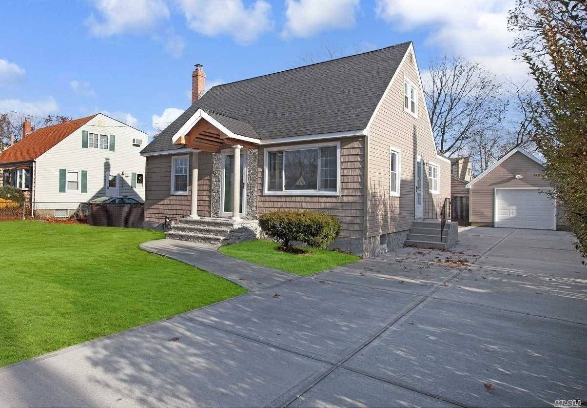 Welcome Home To This Tastefully Renovated 4 Bedroom Cape Located In The Village Of Lindenhurst.