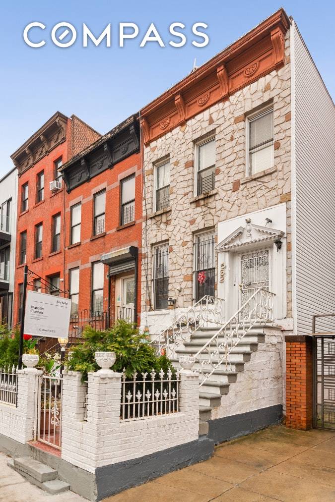 Semi detached legal three family brick house on Lafayette Avenue on the border of Bedford Stuyvesant and Clinton Hill.