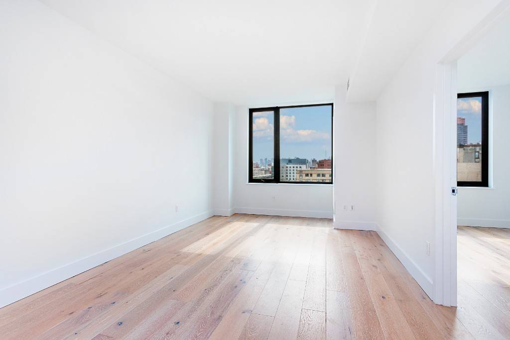 Immaculate 1 bedroom offering sweeping downtown views in Harlems hottest new development, full amenity building !