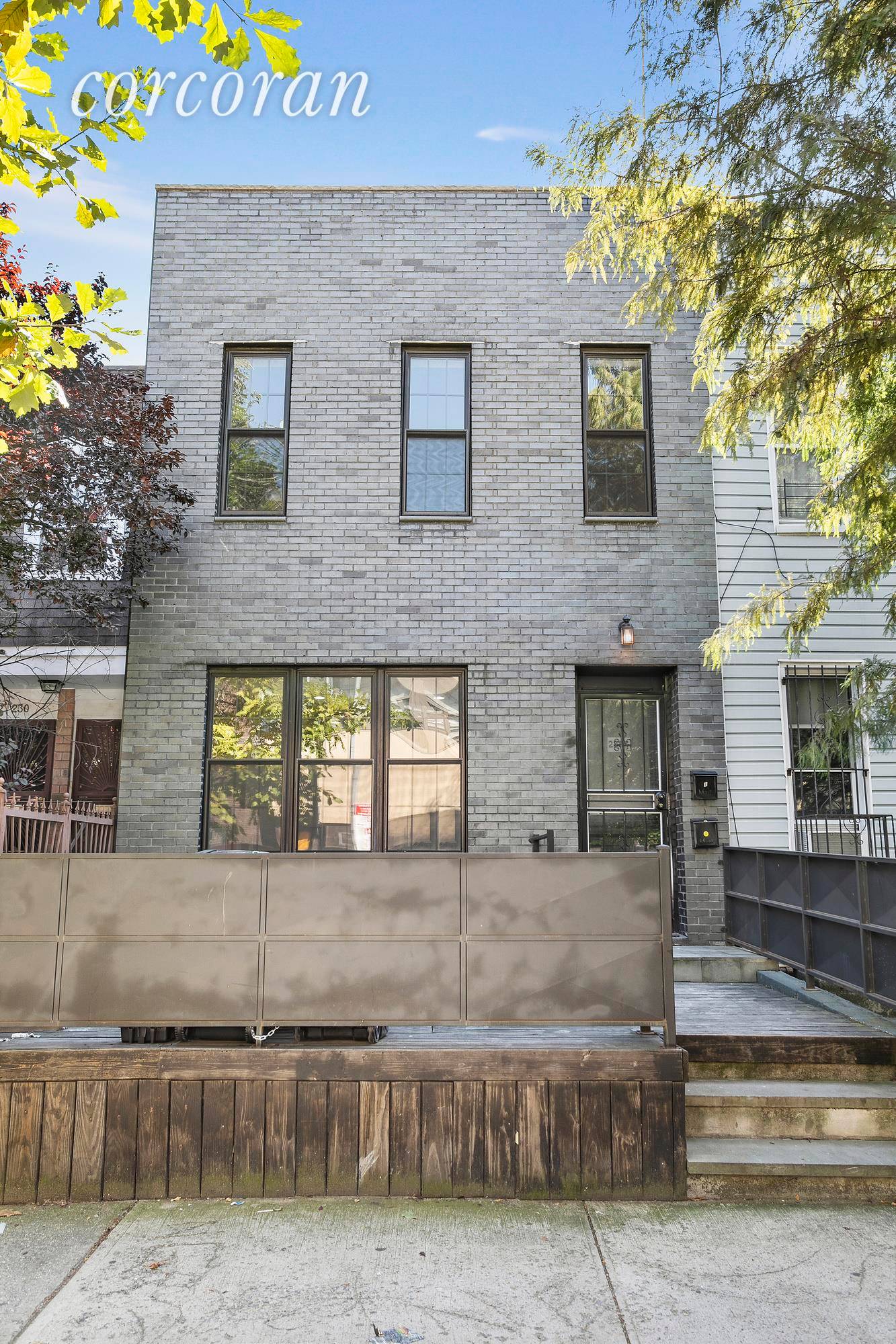 Fully renovated 2 family brick townhouse with finished basement is perfect for investors looking for an immediate 4.