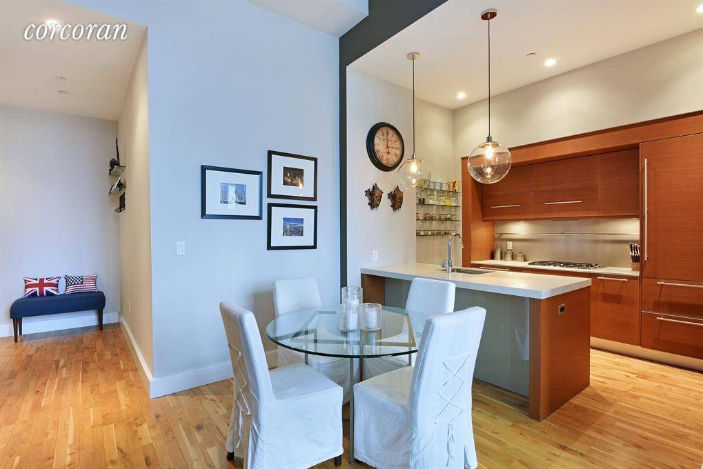 Welcome to Unit 706, a fabulous designer condo loft home with 13' soaring ceilings.