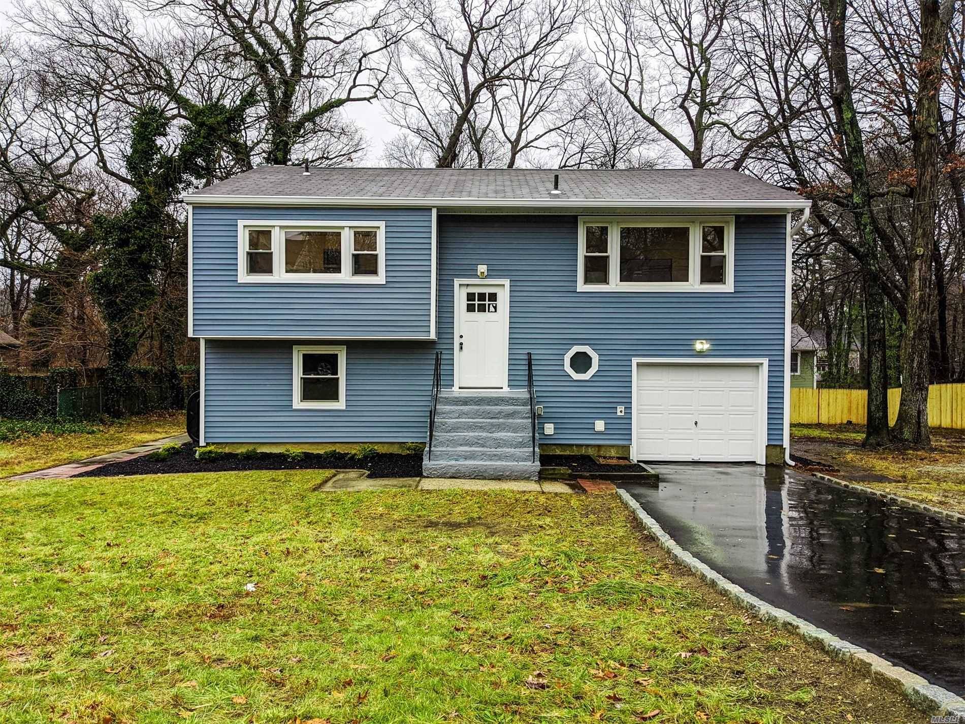24 Oak Crest Drive Is A Diamond Renovated, Turn Key Move In Ready 4 Bedroom 2 Bath Hi Ranch Featuring All New Siding, Hardwood Floors Throughout, Spacious Bedrooms, Large Property ...