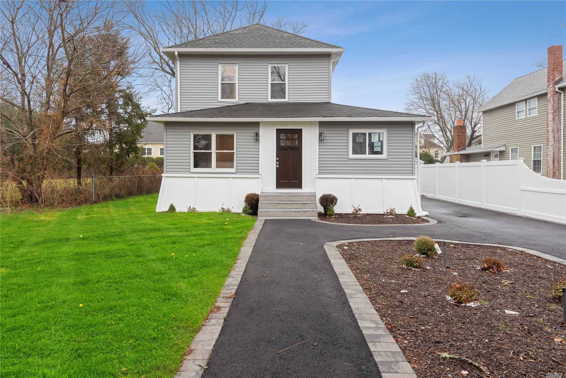 Stunning Renovated Colonial With Classic Charm In The Heart Of Patchogue Village.