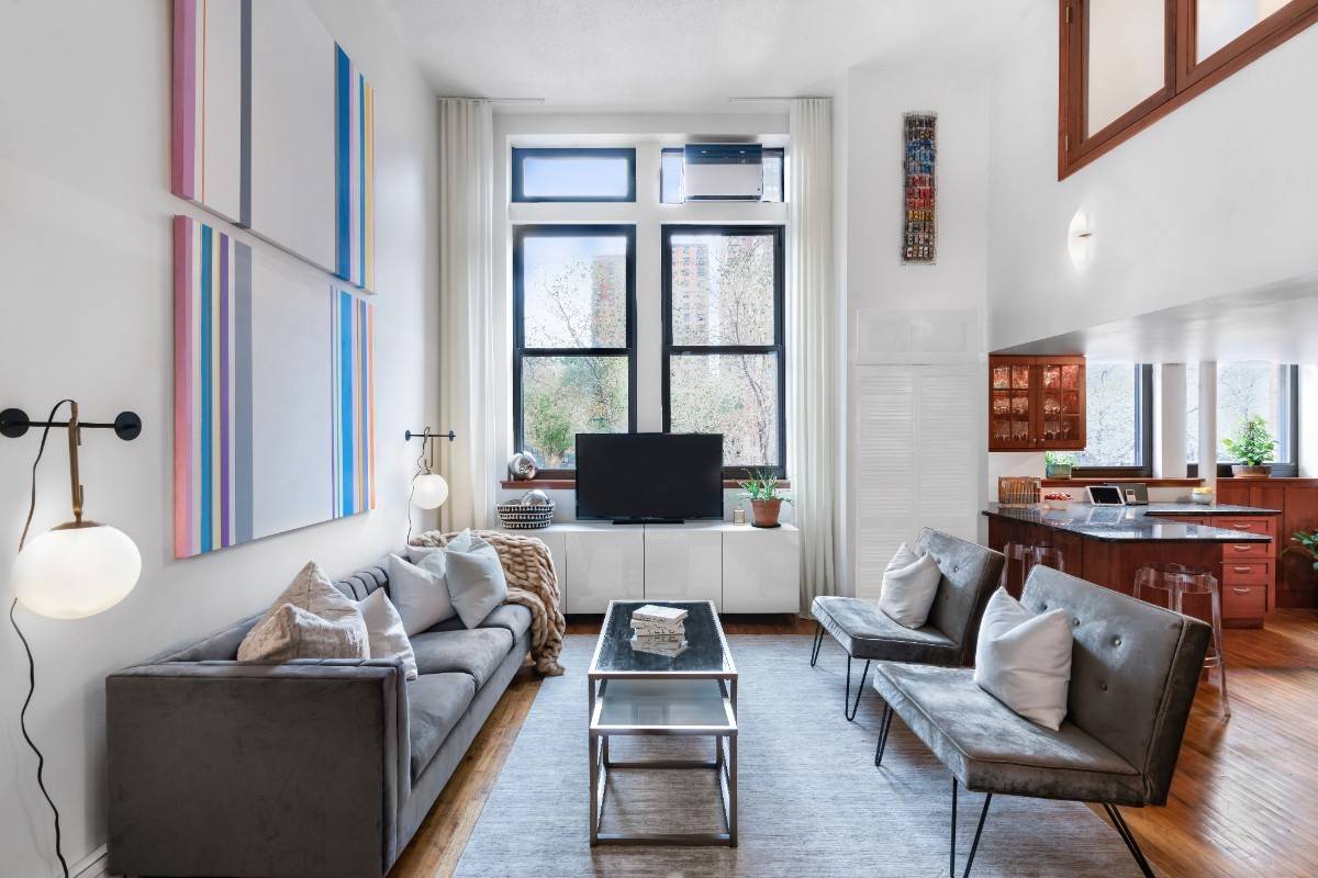 FEATURED IN THE NYT'S ON THE MARKET EXPERIENCE RELAXED NYC LIVING IN THIS AMAZING MULTILEVEL LOFT IN THE HIPPEST PART OF EAST HARLEM.