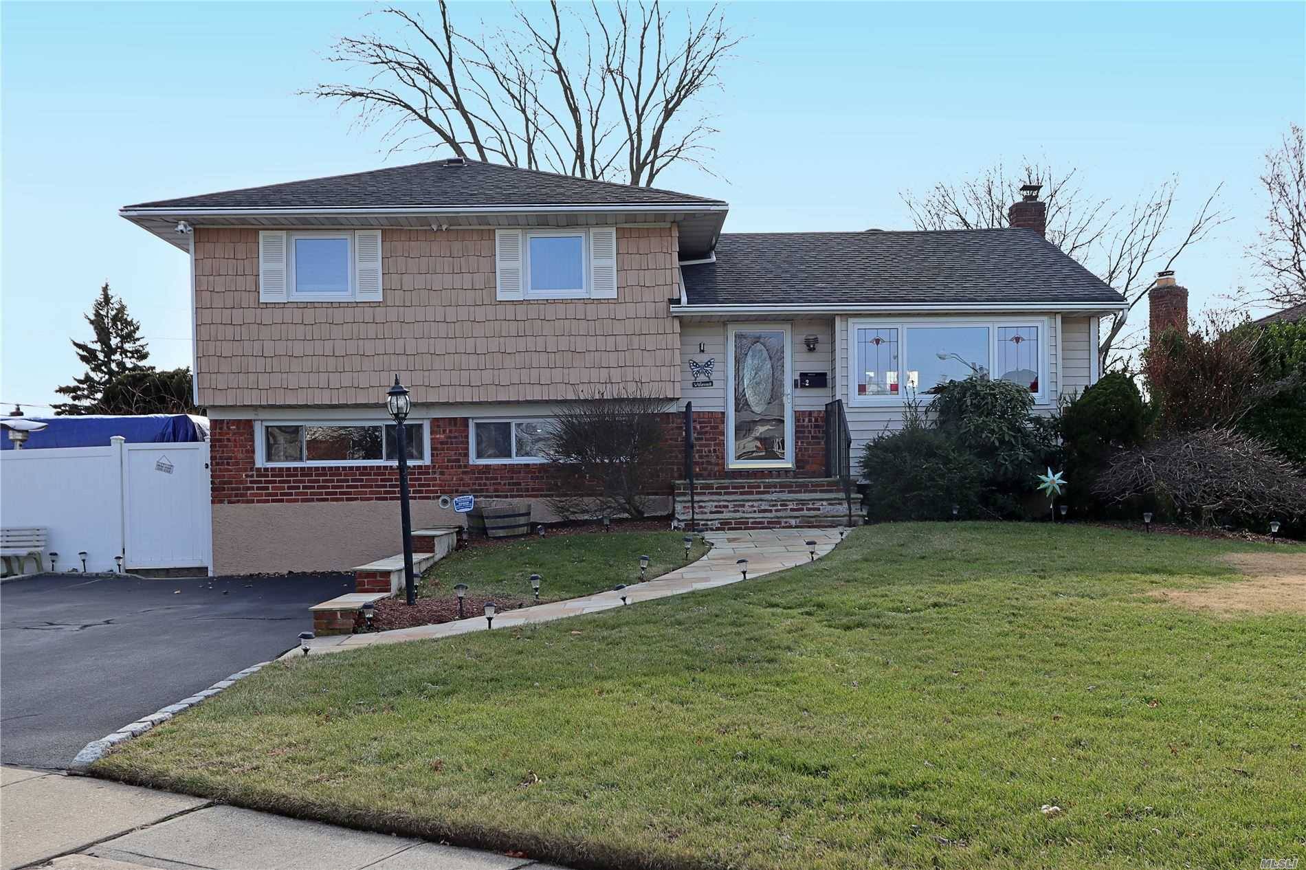 This Spectacular Move In Ready Home Is On A Large Lot in Fabulous Farmingdale !