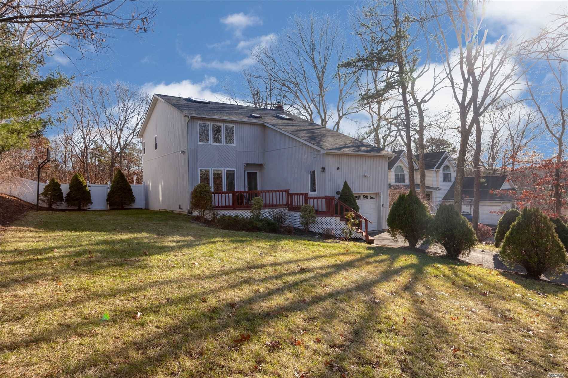Beautifully Renovated Colonial located in Smithtown Pines.