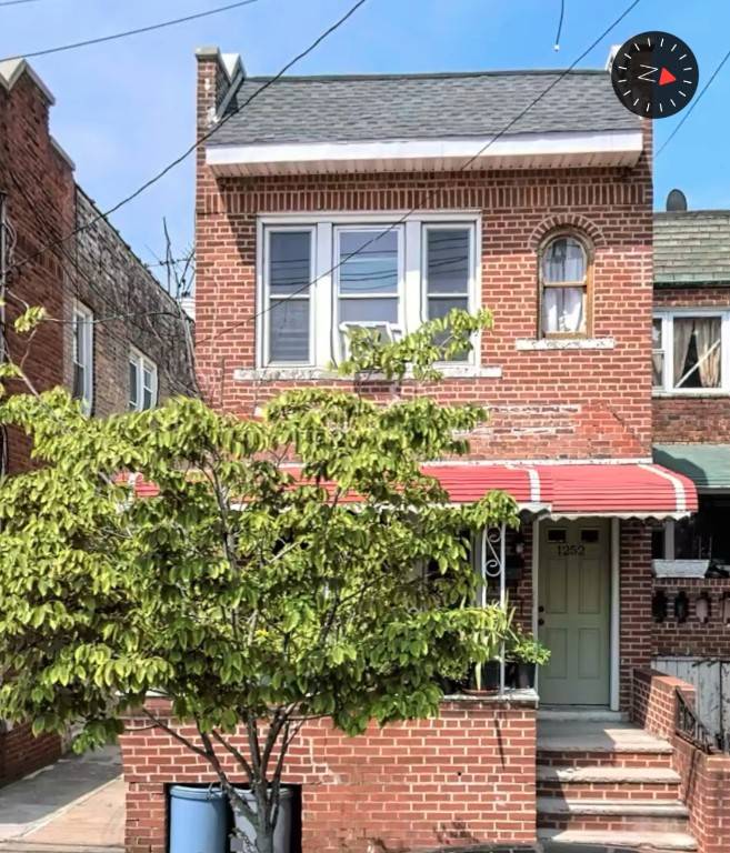 2 family brick house with a front porch, off of Flatbush Avenue between Aves K amp ; L.