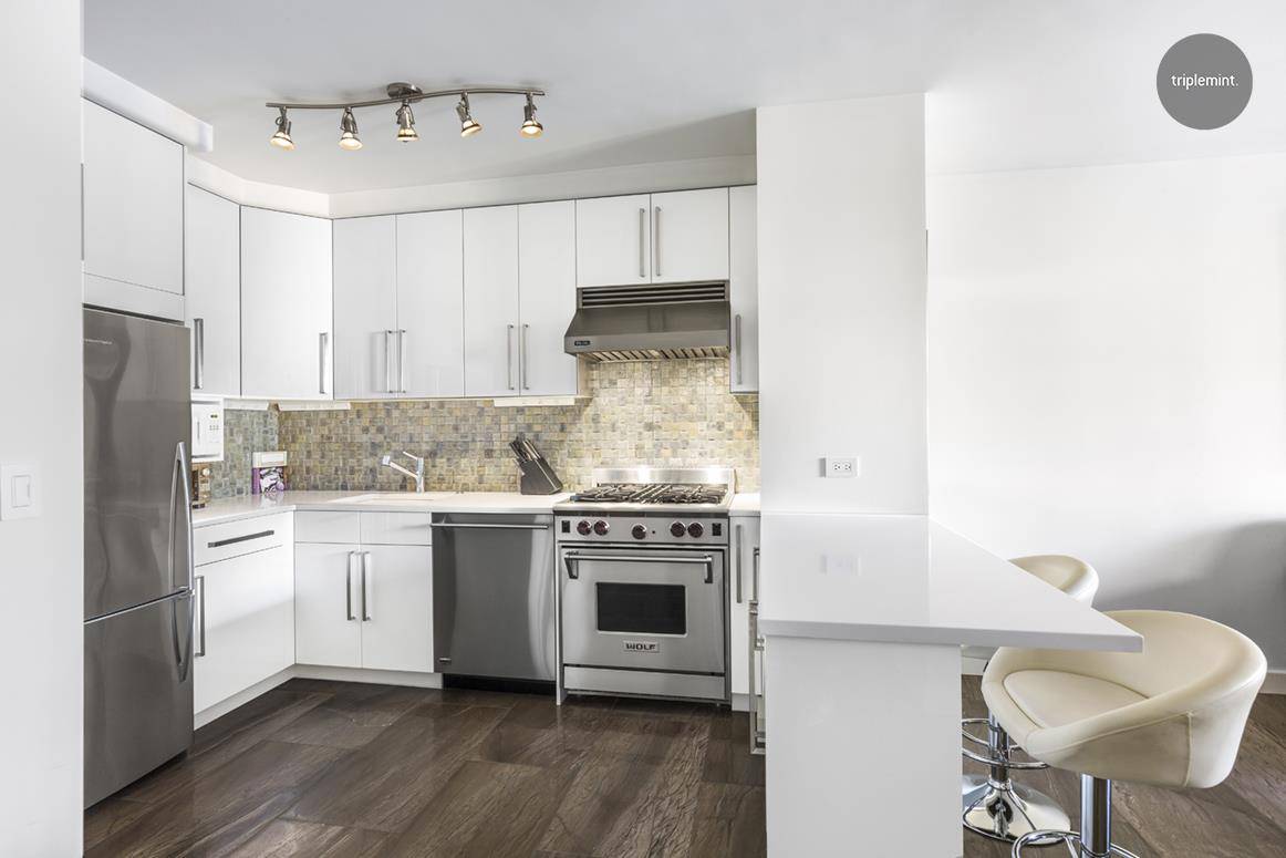 Welcome home to this masterfully renovated spacious condo in the heart of it all.