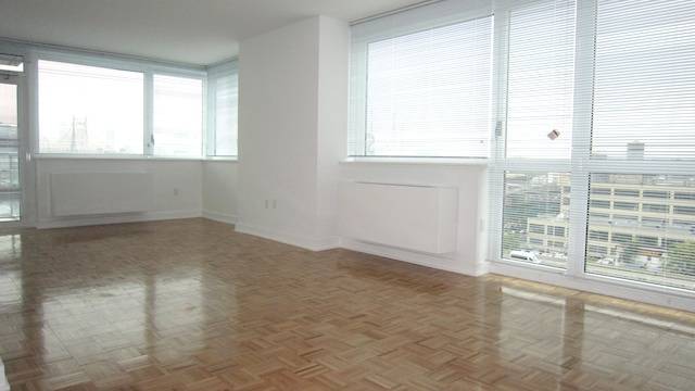 LIC Luxury Rental Buiding ~ Rent Stabilized ~ 24Hour Doorman ~ Gym, Roof Deck, Basket Ball Court ~ One Month Free + No Broker Fee