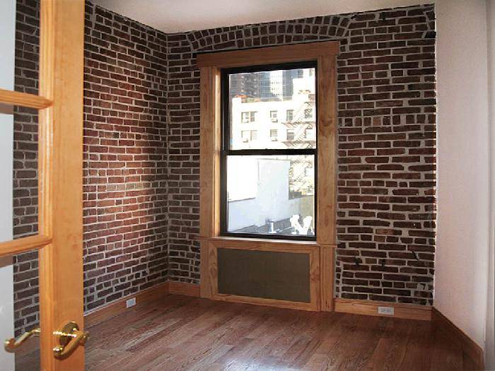 Not a mirage. This beautiful two bedroom w/ Exposed Brick in the East 50's is quite real.