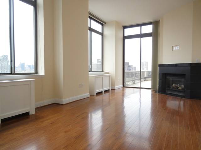 Upper East Side Luxury Penthouse Overlooking the City ~ 2 Private Terraces ~ Chef's Kitchen ~ Fireplace