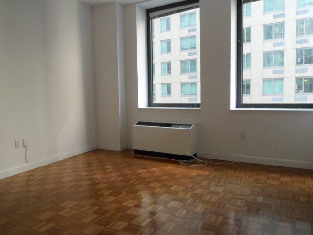 LARGE CONVERTIBLE 2 BED WITH NORTH AND EAST EXPOSURE AND A TON OF WINDOWS IN THE FINANCIAL DISTRICT