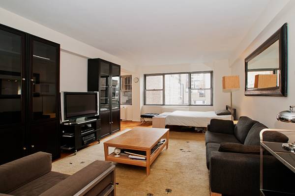Fully Furnished Studio at The Cambridge House | 24 Doorman | 1 minute to MTA | Steps to Chelsea/MPD | 360 Degree City Views