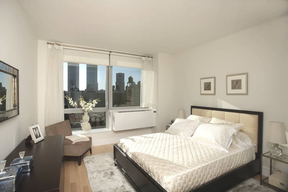 U.W.S. Large 1 BD / BATH featuring High Ceilings, Open Kitchen, Double Closets & City View.  #Green #Location #Luxury Bldg