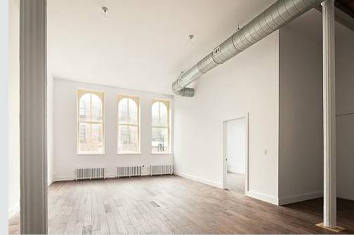 SOHO LOFT FOR RENT: EXPOSED BRICK AND HIGH CEILINGS - A RARE FIND! MASSIVE  1 BEDROOM / 1 BATH