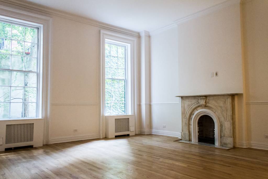 Spacious 5 Bedrooms 4 Baths Single Family Home in the Upper East Side. High Ceilings, Hard Wood Floors, Custom Kitchen Cabinetry, Fireplaces, and Private Garden Area.